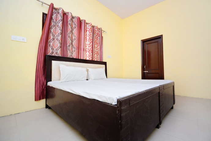 Imagen de la habitación del Hotel SPOT ON 38845 Gursimran Complex. Foto 10