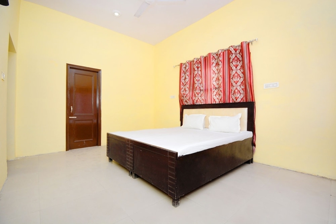 Imagen de la habitación del Hotel SPOT ON 38845 Gursimran Complex. Foto 13