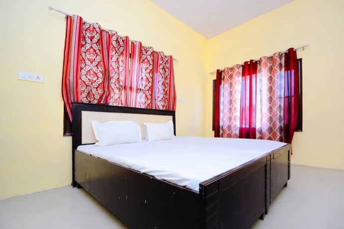 Imagen de la habitación del Hotel SPOT ON 38845 Gursimran Complex. Foto 14