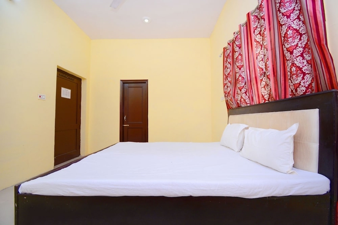 Imagen de la habitación del Hotel SPOT ON 38845 Gursimran Complex. Foto 15