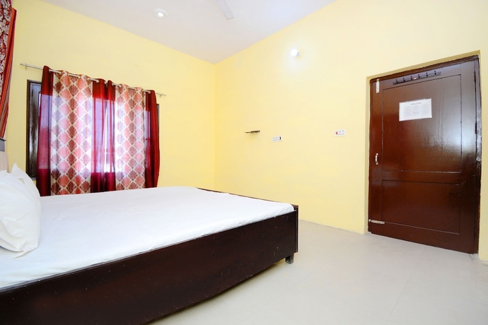 Imagen de la habitación del Hotel SPOT ON 38845 Gursimran Complex. Foto 16