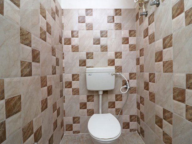 Imagen de la habitación del Hotel SPOT ON 39527 Saraogi. Foto 3