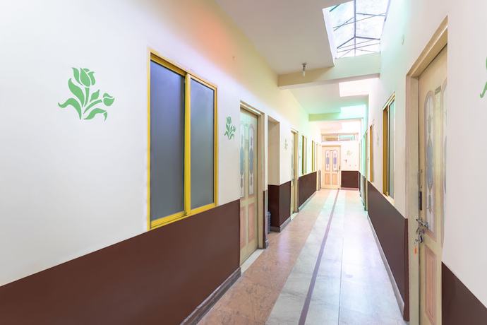 Imagen de los interiores del Hotel SPOT ON 40211 Prakash Inn. Foto 18