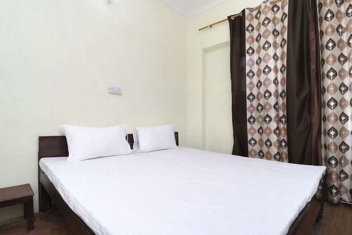 Imagen de la habitación del Hotel SPOT ON 41126 Shri Krishankripa Guest House. Foto 2