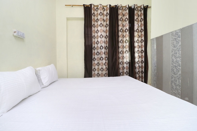 Imagen de la habitación del Hotel SPOT ON 41126 Shri Krishankripa Guest House. Foto 3