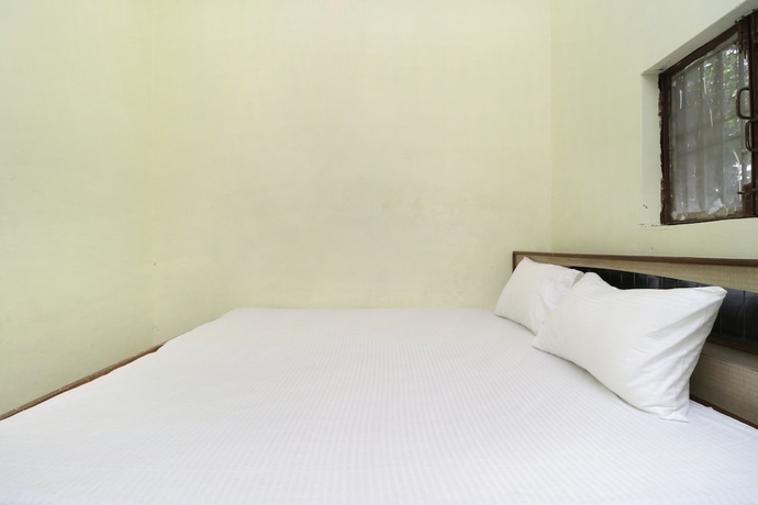 Imagen de la habitación del Hotel SPOT ON 41126 Shri Krishankripa Guest House. Foto 5