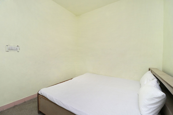 Imagen de la habitación del Hotel SPOT ON 41126 Shri Krishankripa Guest House. Foto 6