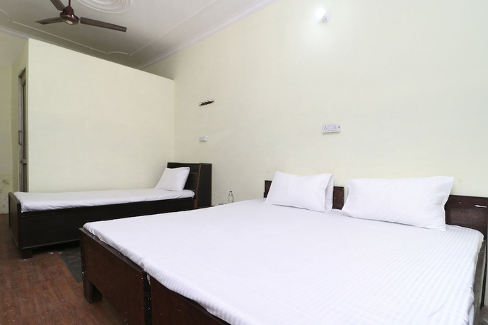 Imagen de la habitación del Hotel SPOT ON 41126 Shri Krishankripa Guest House. Foto 10