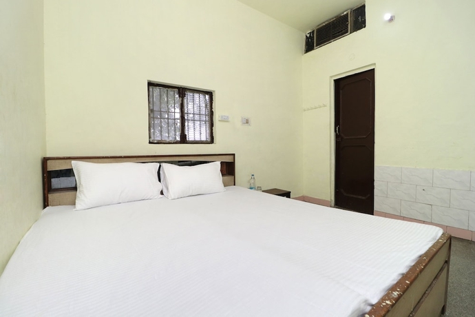 Imagen de la habitación del Hotel SPOT ON 41126 Shri Krishankripa Guest House. Foto 11