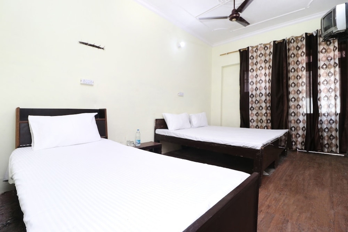Imagen de la habitación del Hotel SPOT ON 41126 Shri Krishankripa Guest House. Foto 12