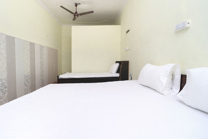 Imagen de la habitación del Hotel SPOT ON 41126 Shri Krishankripa Guest House. Foto 13