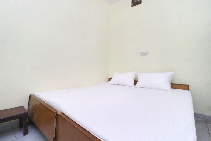 Imagen de la habitación del Hotel SPOT ON 41126 Shri Krishankripa Guest House. Foto 15