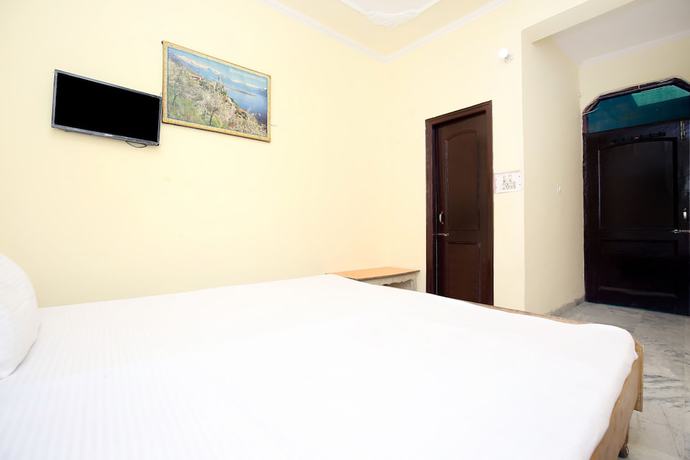 Imagen de la habitación del Hotel SPOT ON 43673 New Mehak Palace. Foto 2