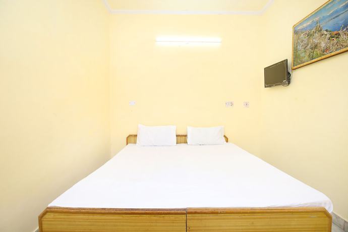 Imagen de la habitación del Hotel SPOT ON 43673 New Mehak Palace. Foto 3