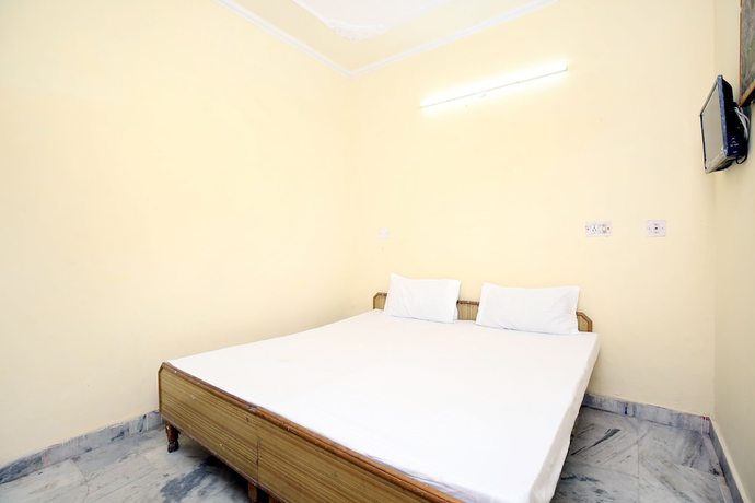 Imagen de la habitación del Hotel SPOT ON 43673 New Mehak Palace. Foto 11