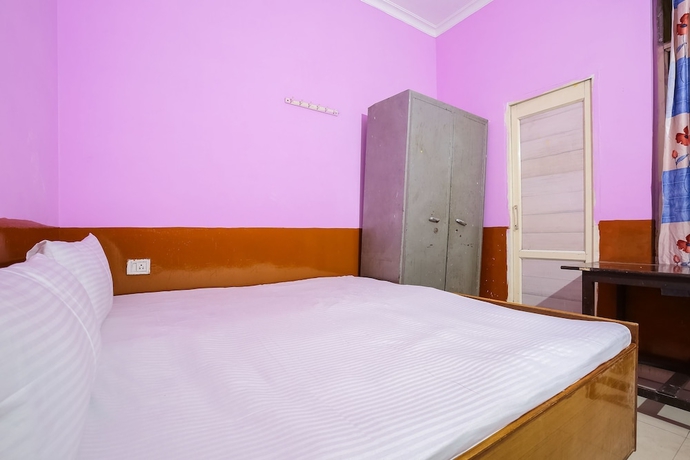 Imagen de la habitación del Hotel SPOT ON 44303 Canadian Guest House. Foto 4