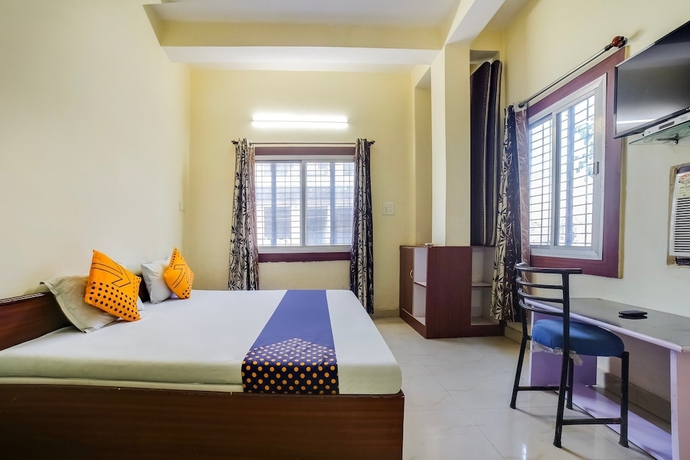 Imagen de la habitación del Hotel SPOT ON 45291 Bharat Lodge. Foto 2