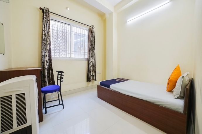 Imagen de la habitación del Hotel SPOT ON 45291 Bharat Lodge. Foto 4