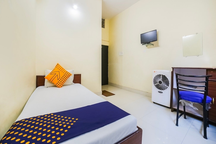 Imagen de la habitación del Hotel SPOT ON 45291 Bharat Lodge. Foto 5