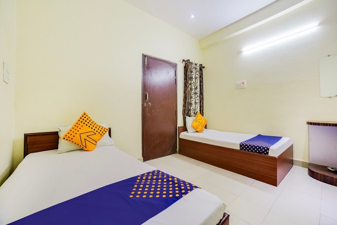 Imagen de la habitación del Hotel SPOT ON 45291 Bharat Lodge. Foto 6