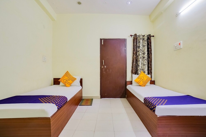 Imagen de la habitación del Hotel SPOT ON 45291 Bharat Lodge. Foto 7