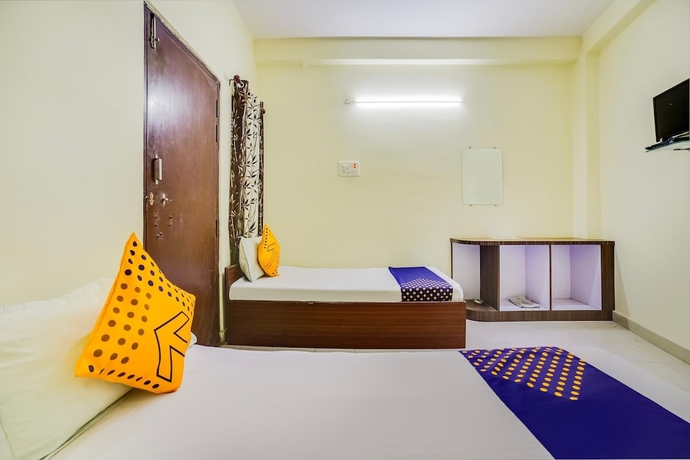Imagen de la habitación del Hotel SPOT ON 45291 Bharat Lodge. Foto 10