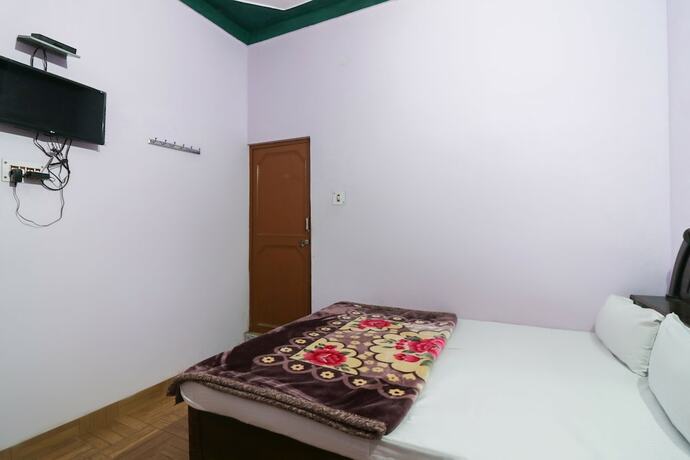 Imagen de la habitación del Hotel SPOT ON 49131 New Shiv Shakti. Foto 18