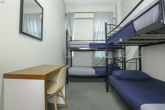 Imagen de la habitación del Hotel SPOT ON 89751 Bed Station Guest House - Hostel. Foto 14