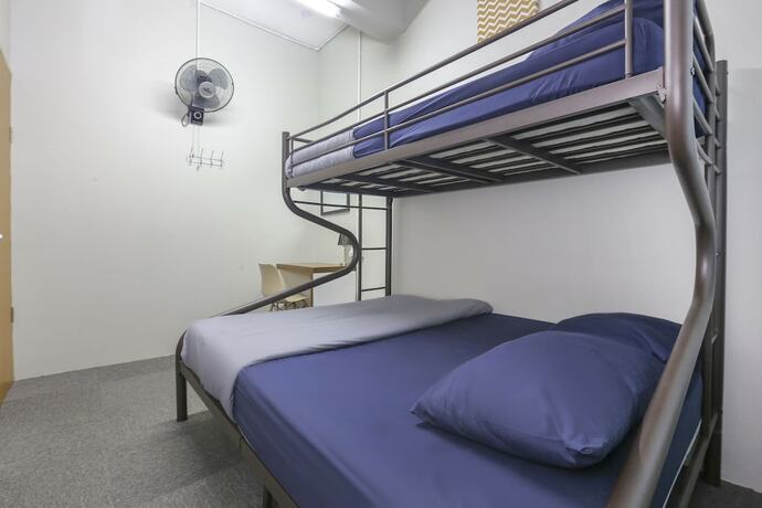 Imagen de la habitación del Hotel SPOT ON 89751 Bed Station Guest House - Hostel. Foto 15