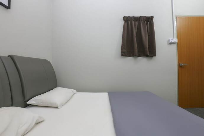 Imagen general del Hotel SPOT ON 89751 Bed Station Guest House - Hostel. Foto 11