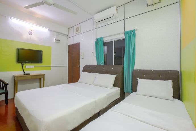 Imagen de la habitación del Hotel SPOT ON 89788 Musafir Transit. Foto 5