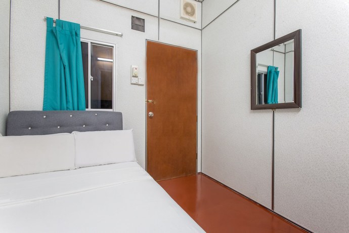 Imagen de la habitación del Hotel SPOT ON 89788 Musafir Transit. Foto 9