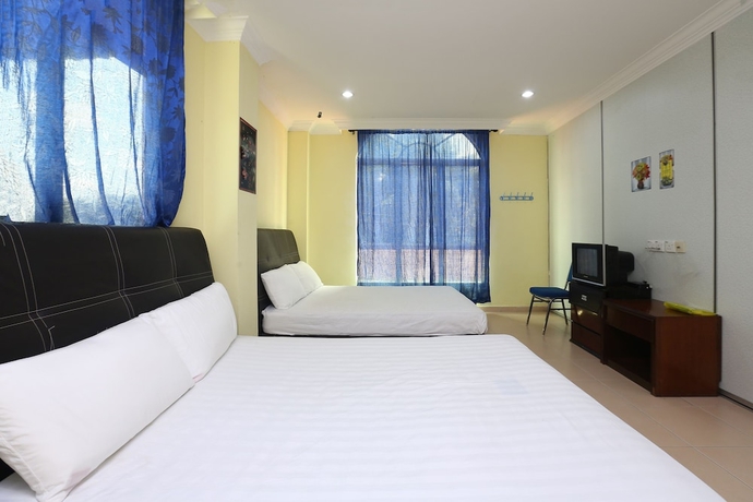 Imagen de la habitación del Hotel SPOT ON 89857 Azra Inn Rumah Tumpangan. Foto 6