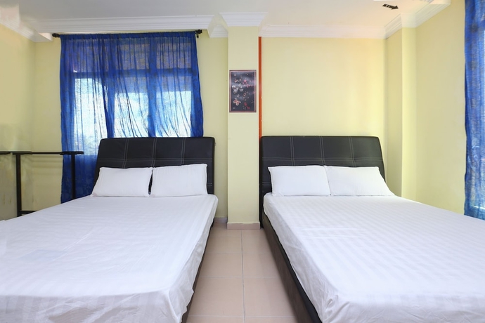 Imagen de la habitación del Hotel SPOT ON 89857 Azra Inn Rumah Tumpangan. Foto 13
