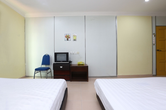 Imagen de la habitación del Hotel SPOT ON 89857 Azra Inn Rumah Tumpangan. Foto 14