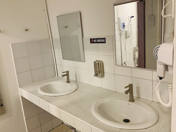 Imagen de la habitación del Hotel SPOT ON 89900 Jesselton Capsule Inn. Foto 12
