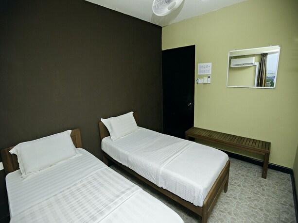 Imagen de la habitación del Hotel SPOT ON 89967 Tabin Lodge Bed & Breakfast. Foto 12