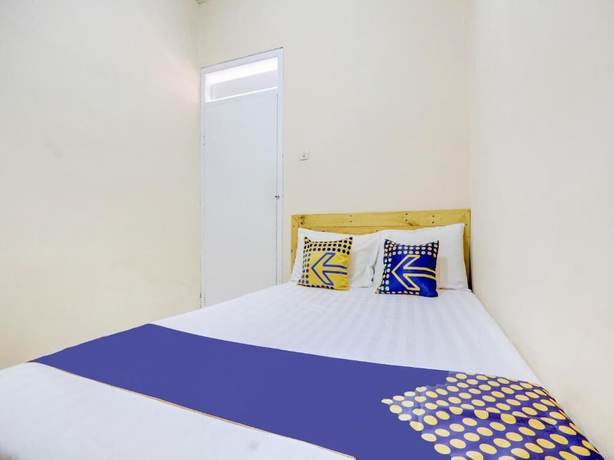 Imagen de la habitación del Hotel SPOT ON 90156 Ramayana. Foto 6