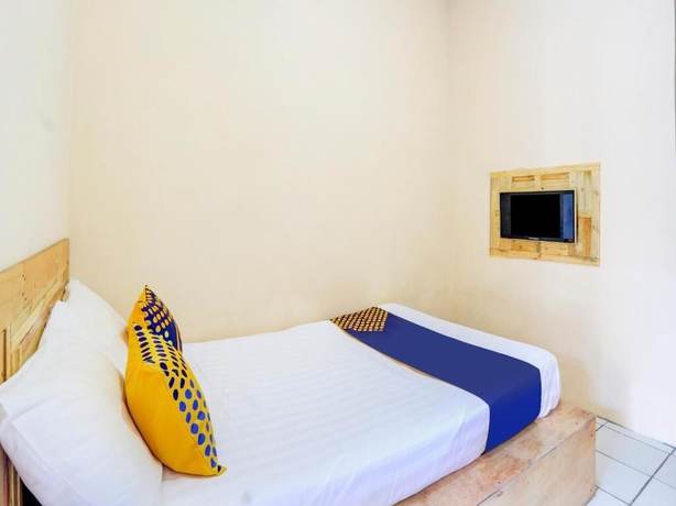 Imagen de la habitación del Hotel SPOT ON 90156 Ramayana. Foto 9