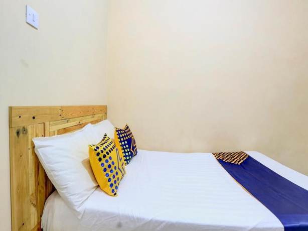 Imagen de la habitación del Hotel SPOT ON 90156 Ramayana. Foto 12