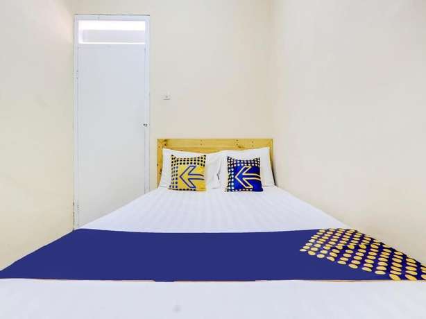 Imagen de la habitación del Hotel SPOT ON 90156 Ramayana. Foto 14