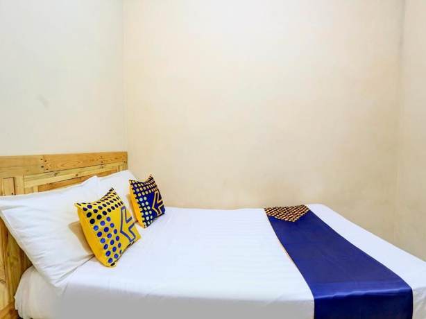 Imagen de la habitación del Hotel SPOT ON 90156 Ramayana. Foto 15