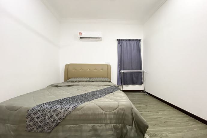 Imagen de la habitación del Hotel SPOT ON 90279 Kinomulok Garden. Foto 3