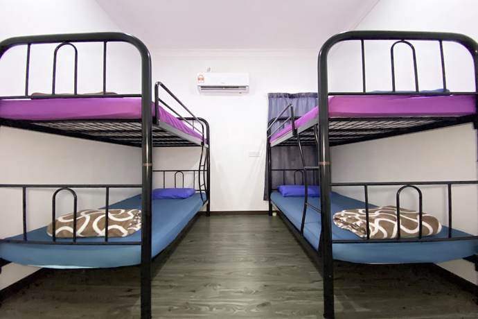 Imagen de la habitación del Hotel SPOT ON 90279 Kinomulok Garden. Foto 7