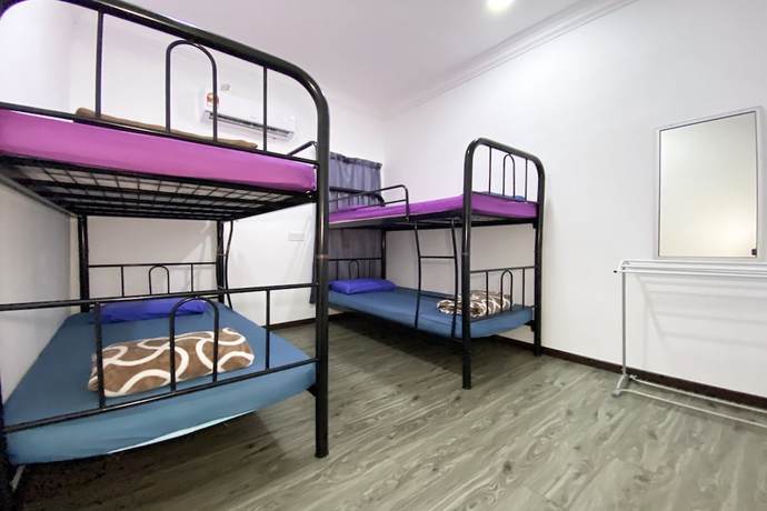 Imagen de la habitación del Hotel SPOT ON 90279 Kinomulok Garden. Foto 8