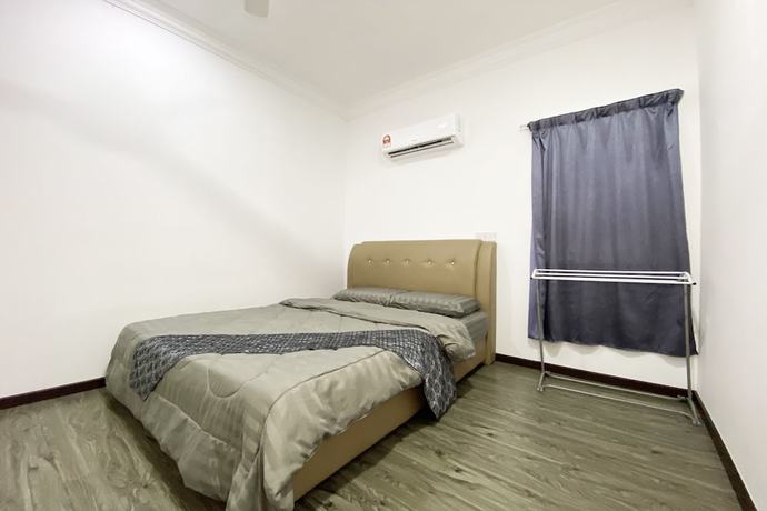 Imagen de la habitación del Hotel SPOT ON 90279 Kinomulok Garden. Foto 9