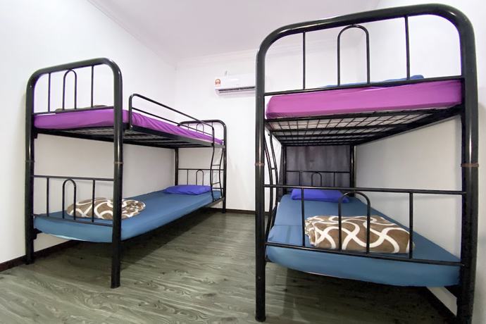 Imagen de la habitación del Hotel SPOT ON 90279 Kinomulok Garden. Foto 10