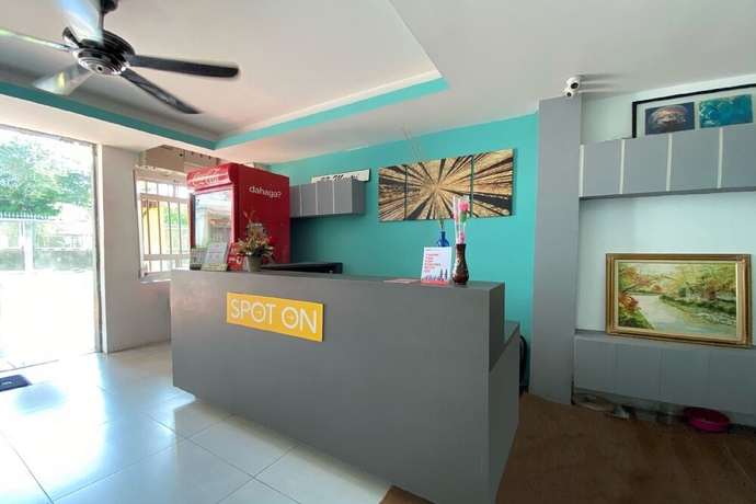 Imagen de los interiores del Hotel SPOT ON 90283 27 Muntri. Foto 11