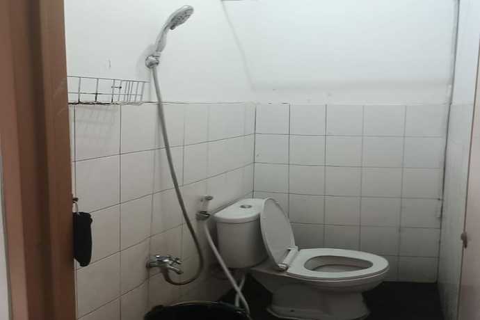 Imagen de la habitación del Hotel SPOT ON 90538 Wisma Dewi Syariah. Foto 6