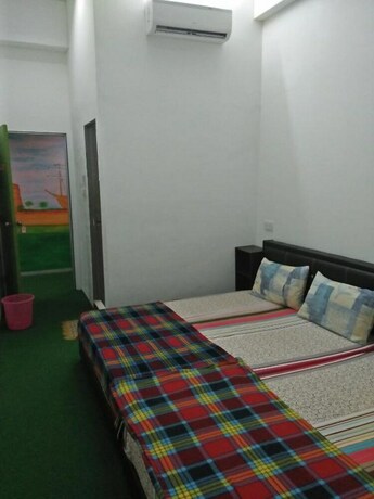 Imagen de la habitación del Hotel SPOT ON 90870 Karim Ct Guest House. Foto 14